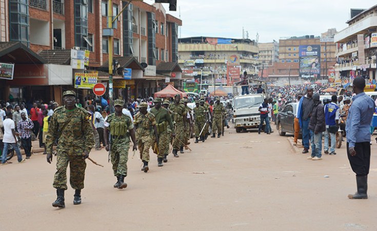 Ugandan security officers on patrol in downtown Kampala