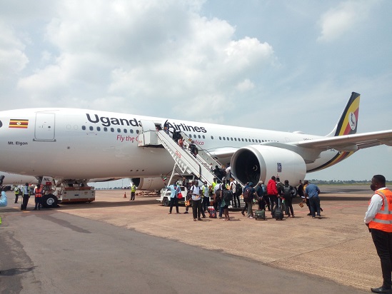 Passengers-boarding-the-Airbus-ahead-of-Uganda-Airlines-maiden-flight-to-India